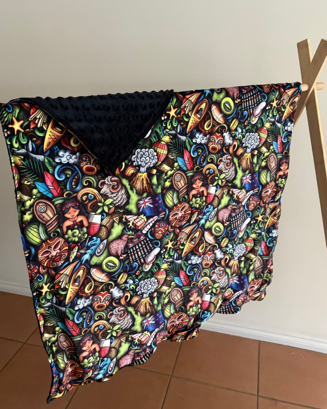 Aotearoa Pram Blanket close-up of Aotearoa print fabric