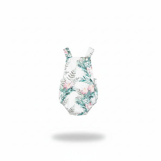 Protea Playsuit handmade cotton baby playsuit on white background